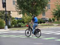 Capital Bikeshare e-bike on green bike lane 