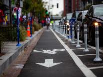 bicycle symbol on asphalt to signify bike lane