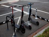 Scooters in off sidewalk corral 