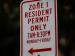 red and white residential permit parking sign